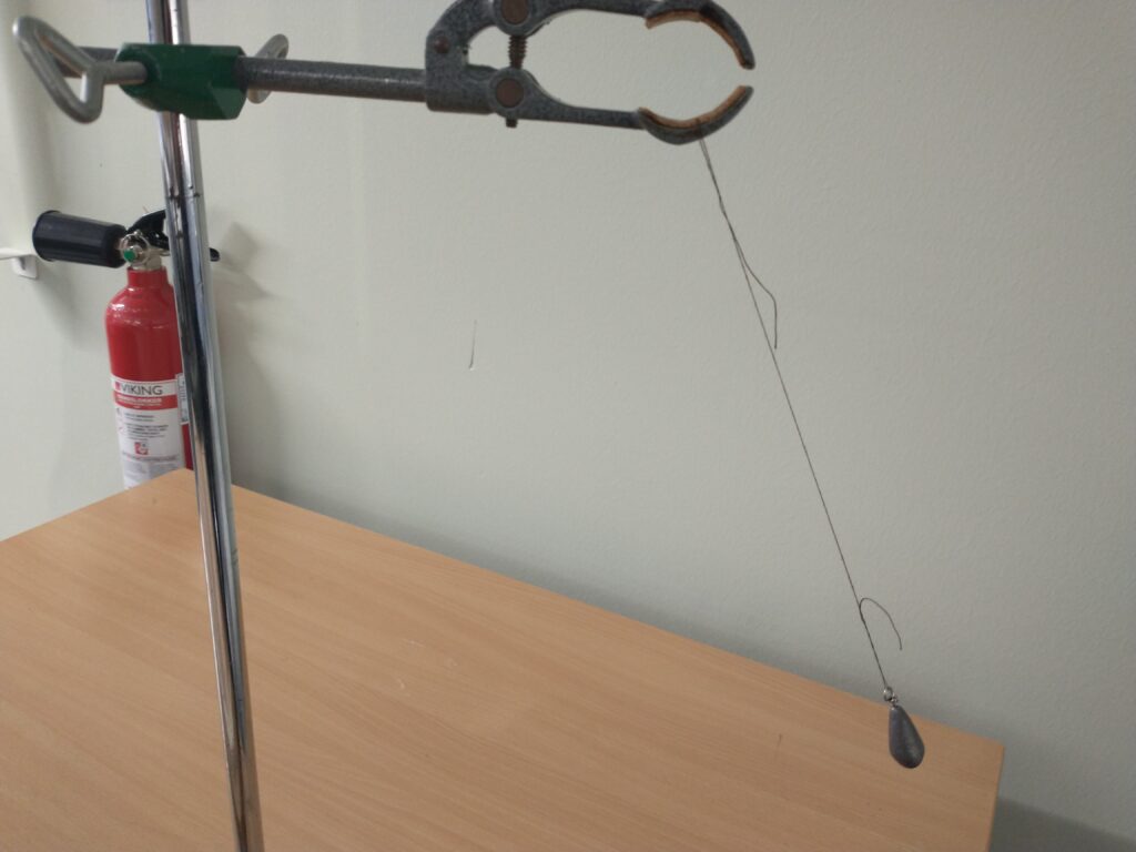 Eksperimentere med en pendel